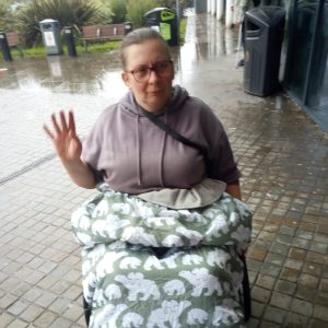 Charlotte using a bundlebean on her wheelchair