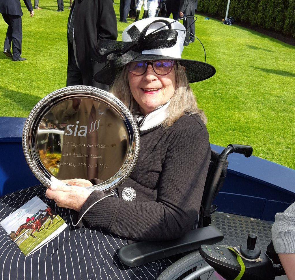 Baroness Masham getting ready to present the trophy to the winners of a SIA horse race